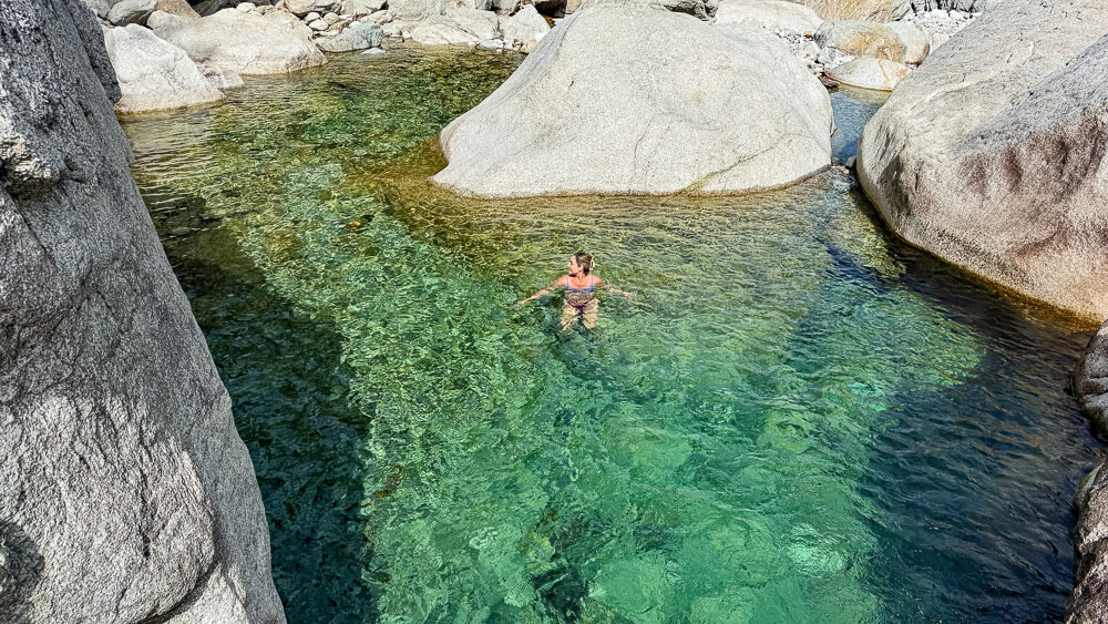 blue pool of water in the Restonica Valley Corte Corsica